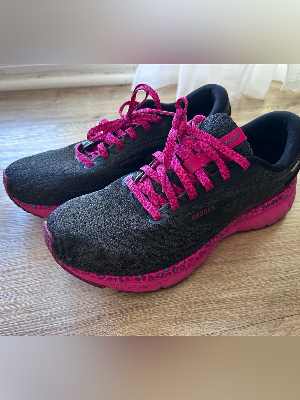 Brooks Trace 2 running shoes in Magenta/Black/Ebony, size 10